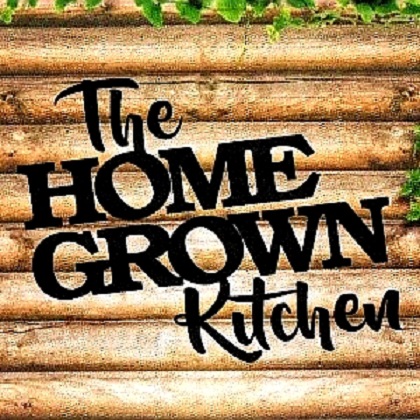 The Homegrown Kitchen logo on wooden background.