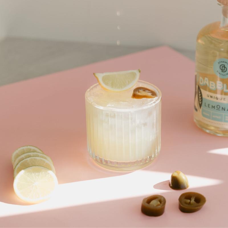 Iced lemon drink with lemon slices and jalapeño