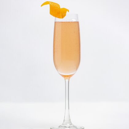 Champagne flute with orange twist garnish