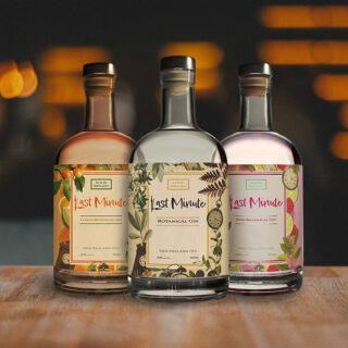 Three Last Minute Gin bottles