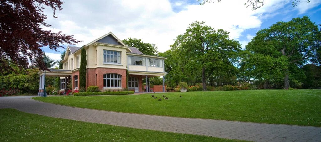 Historic house with garden and trees